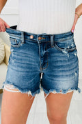 Asymmetric Raw Hem Distressed Denim Shorts