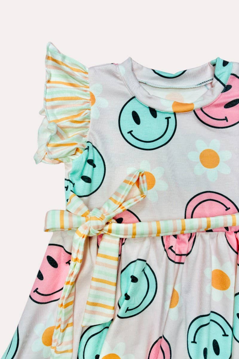 Girl’s happy face & daisy swirl dress