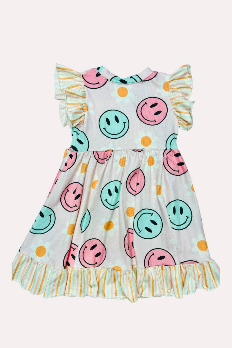 Girl’s happy face & daisy swirl dress