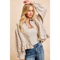 TEXTURED FLORAL PATTERN RUFFLED HEM TOP