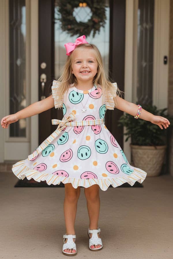 Girl’s happy face & daisy swirl dress
